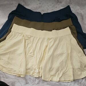 Elegant Women's Skater Skirt Trio in Cream, Tan, and Blue
